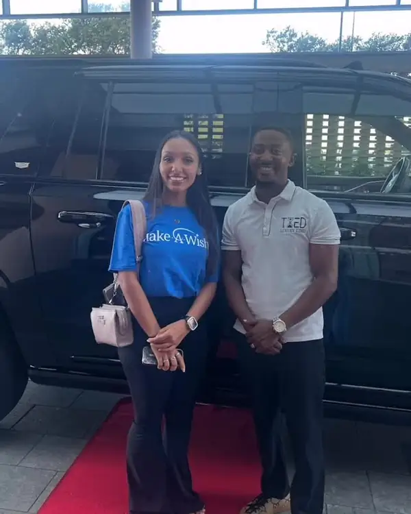 Make-A-Wish team member with a TIED team member on the red carpet